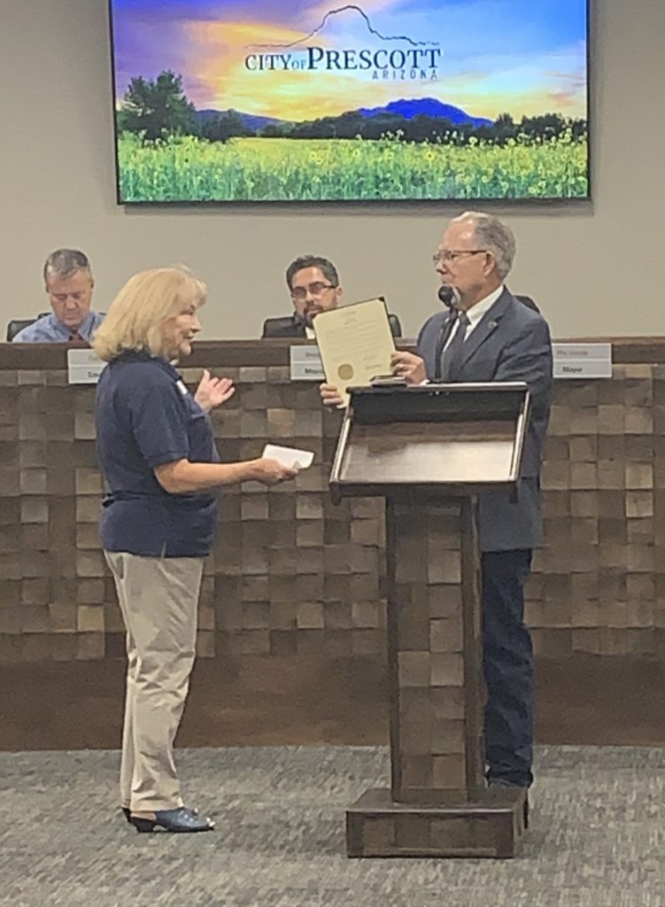 This is a photo of a chapter member accepting a proclamation for Constitution Week at a Prescott City Council meeting.