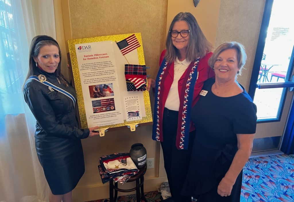 This photo shows The Arizona State Society Regent, the General George Crook Chapter Regent, and American Heritage Committee Chair at an SAR/DAR luncheon where funds were raised for the Patriotic Pillowcase Project.